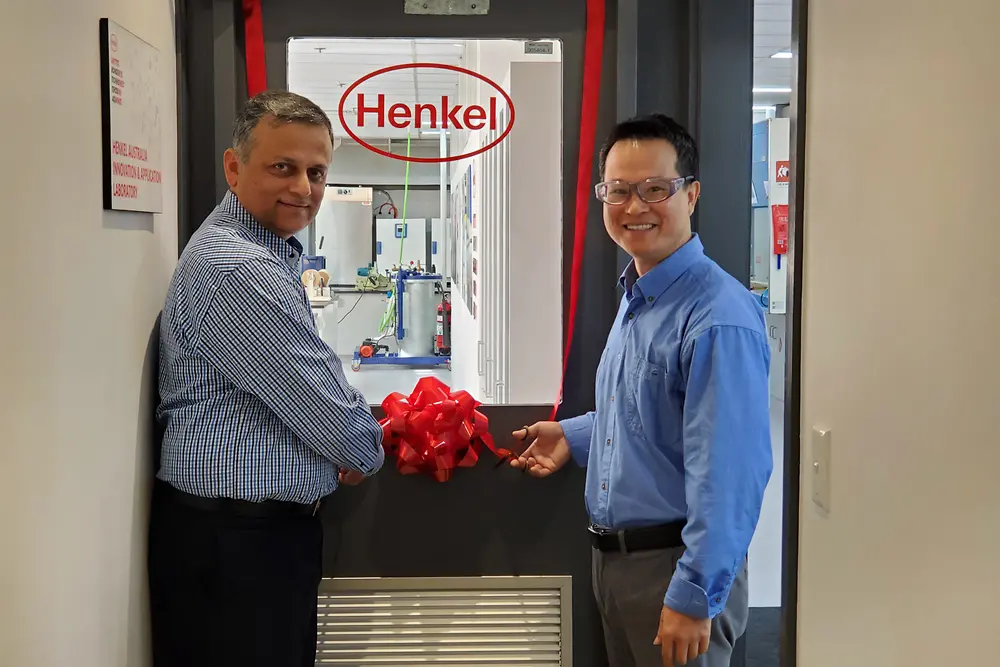 Aamir Qureshi (left), Operations & Supply Chain Manager, and Stephen Liu (right), Product Development Chemist, cutting the ribbon to mark the official opening of the upgraded Innovation and Application Lab of Adhesive Technologies in Sydney. 